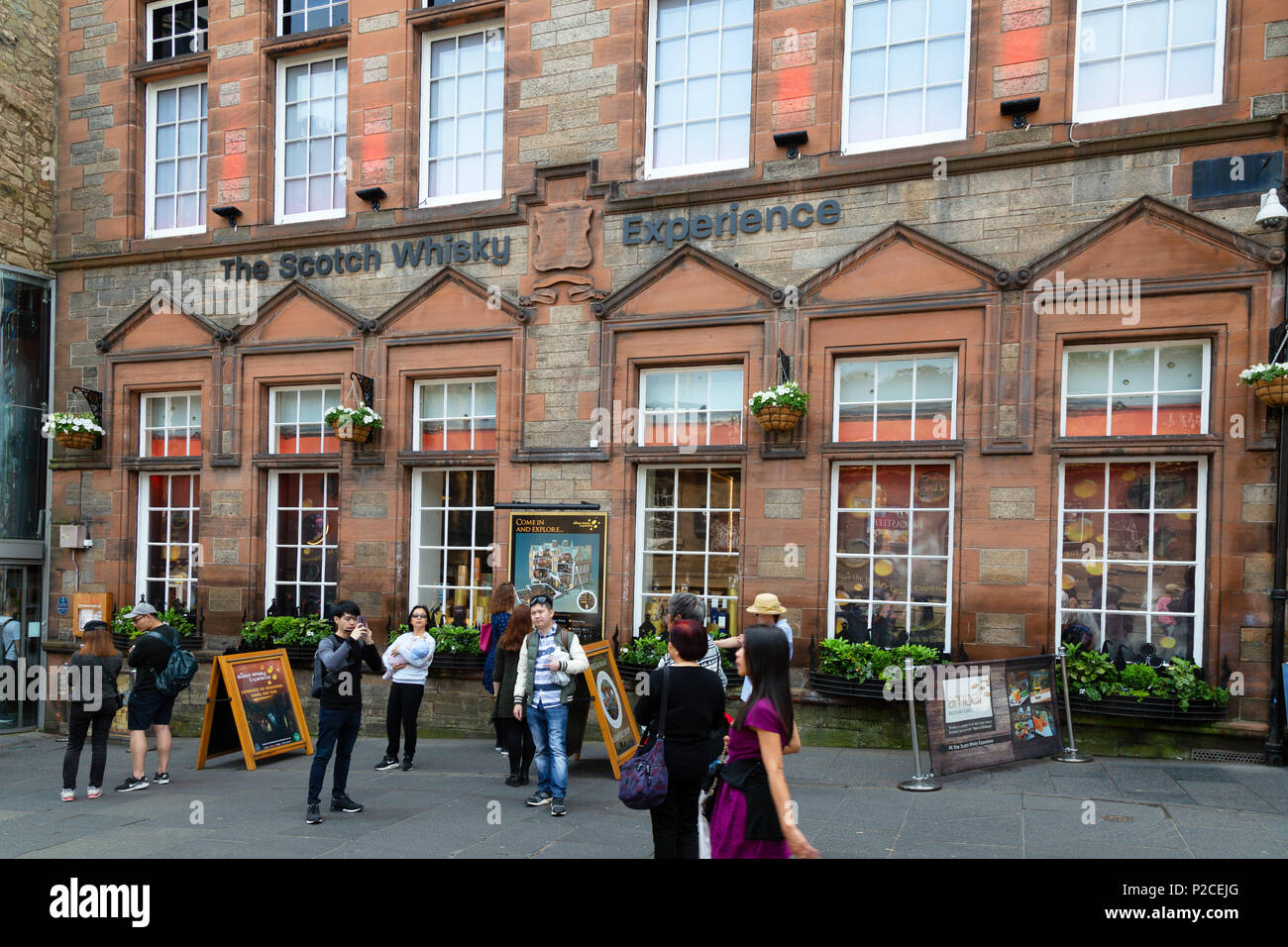 Tourists at The Scotch Whisky Experience, the Royal Mile, Edinburgh Old Town, Edinburgh Scotland UK Stock Photo