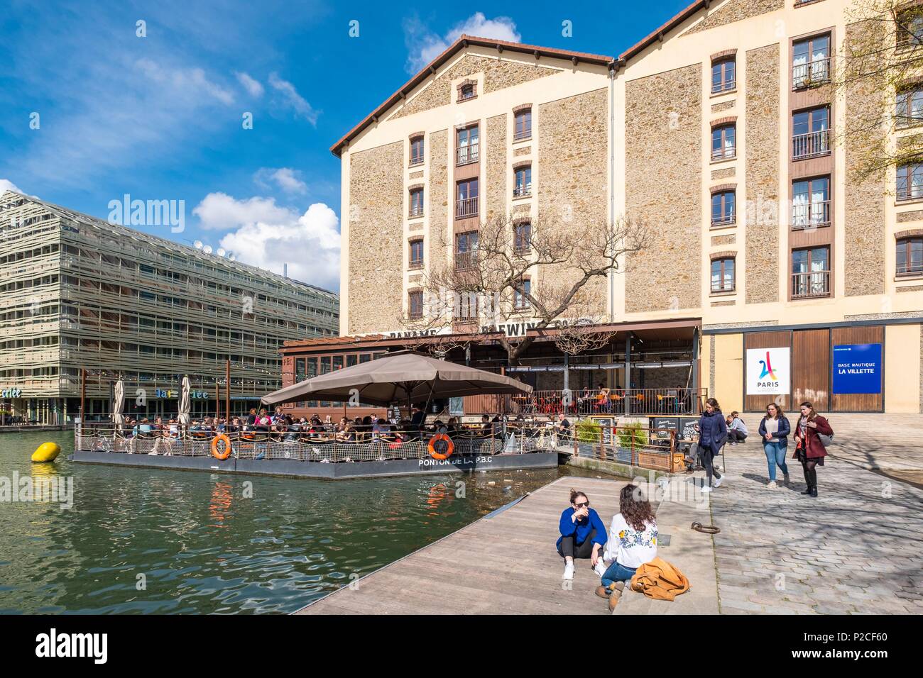 France, Paris, La Villette Basin, the largest artificial waterway in Paris  that connects the Ourcq Canal to the Canal Saint-Martin, bar-restaurant and  craft brewery, Paname Brewing Compagny or PBC Stock Photo -