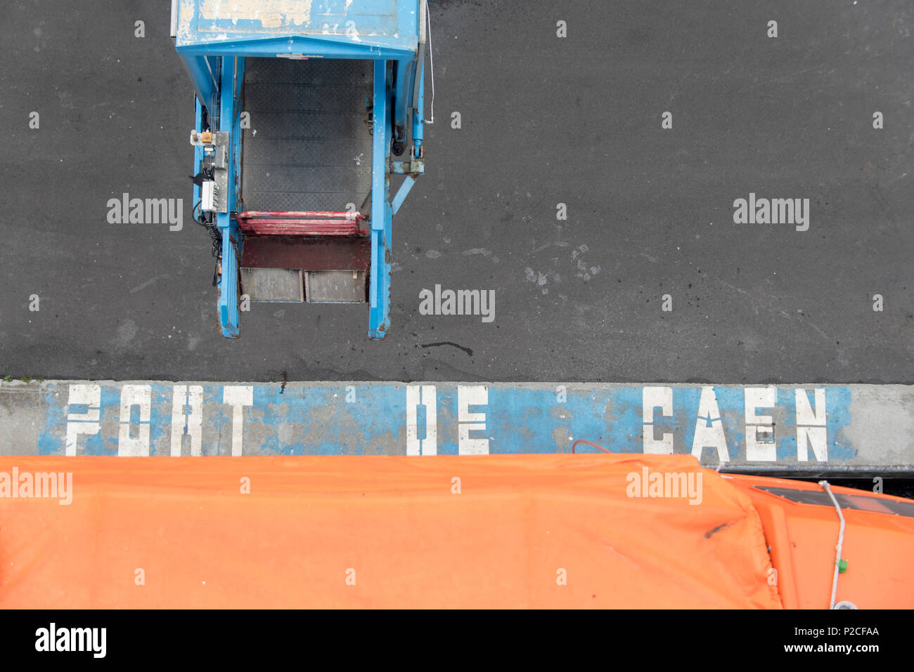 Looking down at the dock from the upper deck of the Portsmouth Caen ferry. Stock Photo