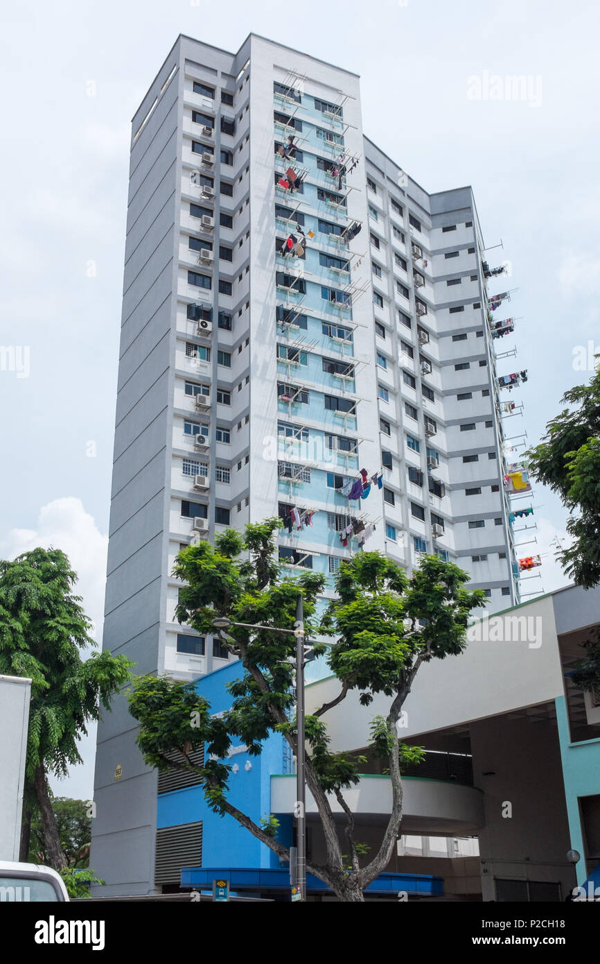 Apartment block in Serangoon Road in the Little India district of Singapore with washing hanging outside from balconies Stock Photo