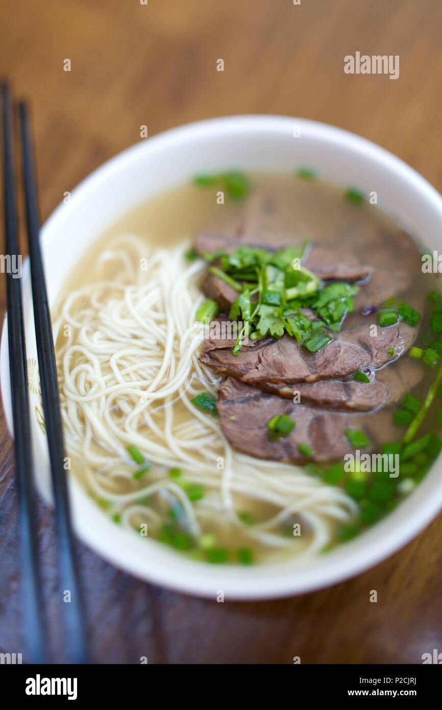 Singapore, street food, Chinese soup with wheat noodles and beef Stock