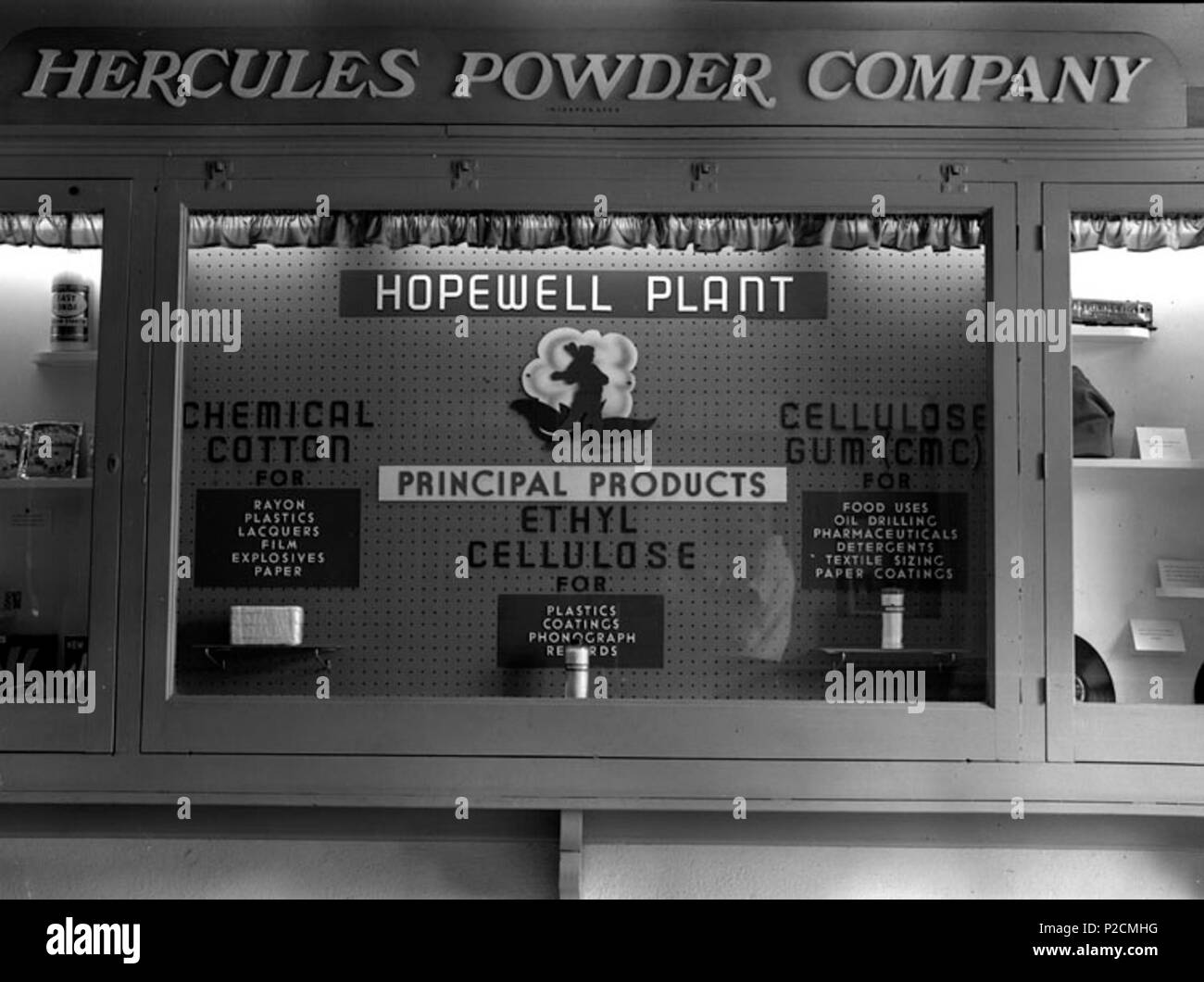 . Title: Display in municipal building Date: 1955 May Identifier: Hopewell UMWA Collection 795A Format: 1 negative, safety film Rights Info: No known restrictions on publication. Repository: Library of Virginia, Prints and Photographs, 800 E. Broad St., Richmond, VA, 23219, USA, <a href='http://digitool1.lva.lib.va.us:8881/R' rel='nofollow'>digitool1.lva.lib.va.us:8881/R</a> . 18 August 2011, 11:41:17. The Library of Virginia 24 Hercules Powder Company display in municipal building Stock Photo