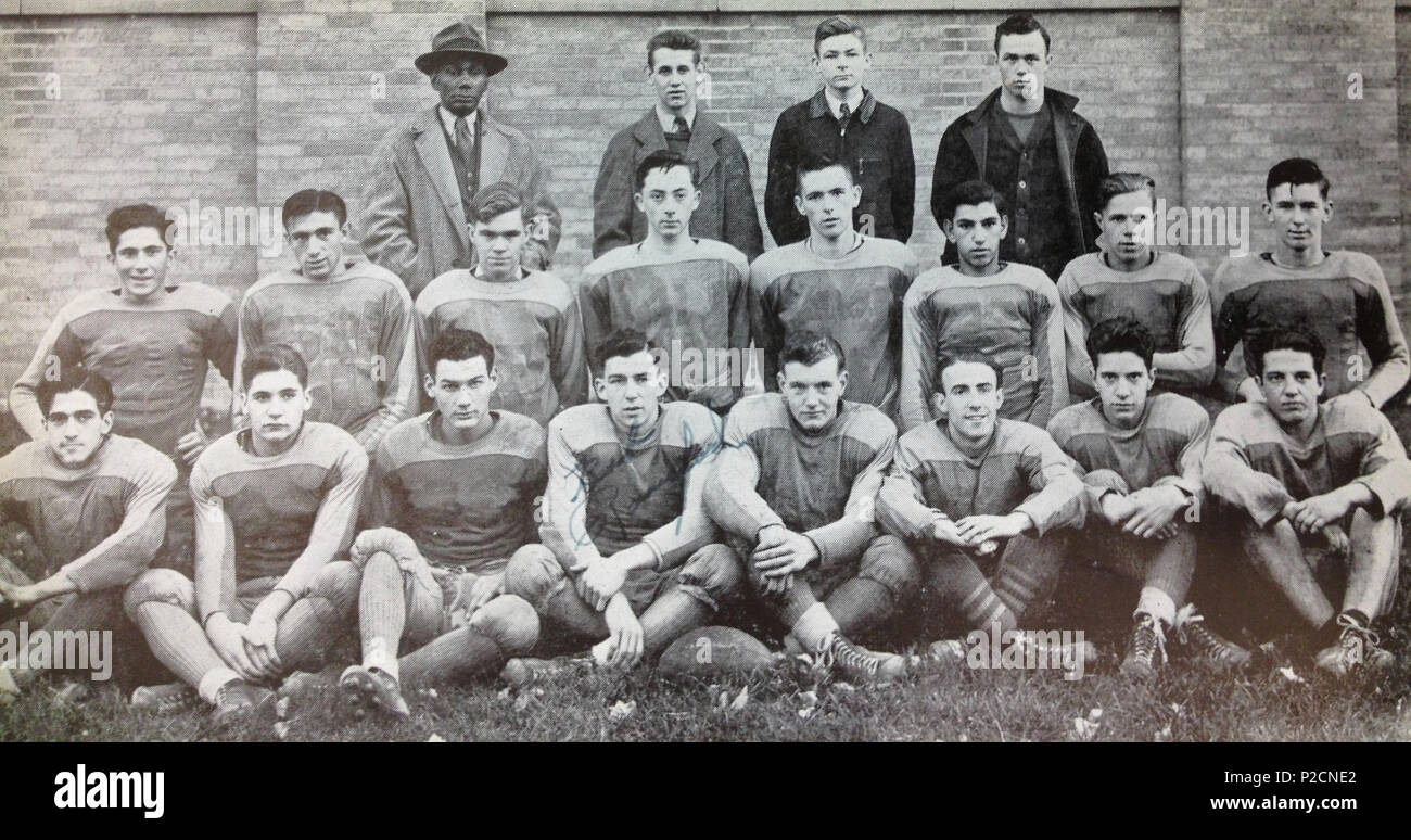 . English: DeSales High School, Geneva, NY's head football coach and his team from Fall 1940. The image comes from the 1941 Salesian, the school's yearbook. June 1941. Unknown student photographer for the DHS yearbook (Life time: Unknown) 24 Henry-C-McDonald-1940 Stock Photo