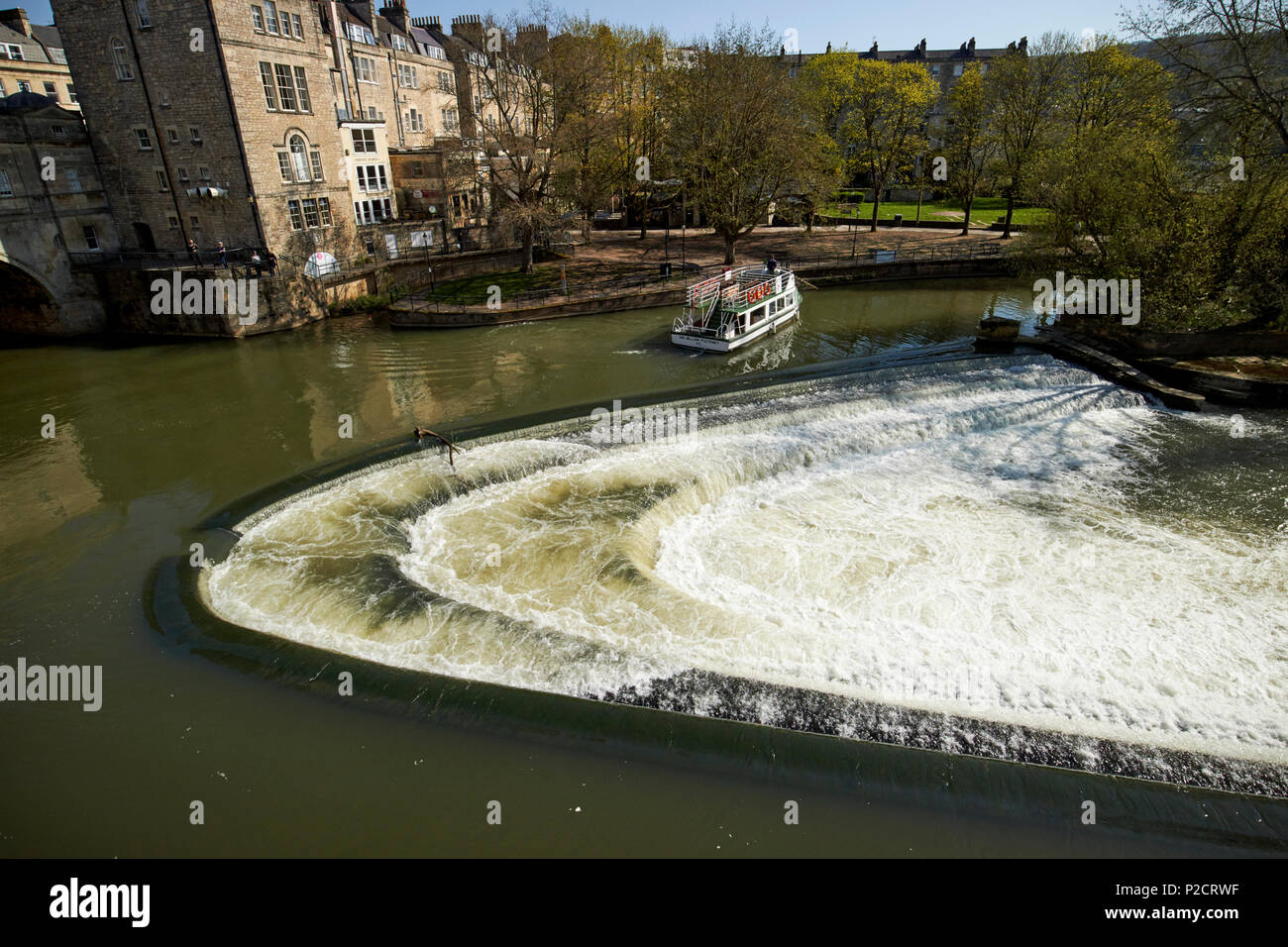 The pulteney bridge pulteney weir on the river avon in Bath city centre ...