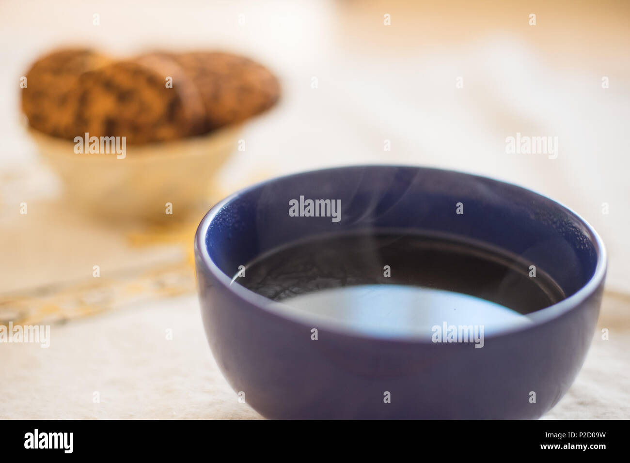 round large bowl over which steam Stock Photo