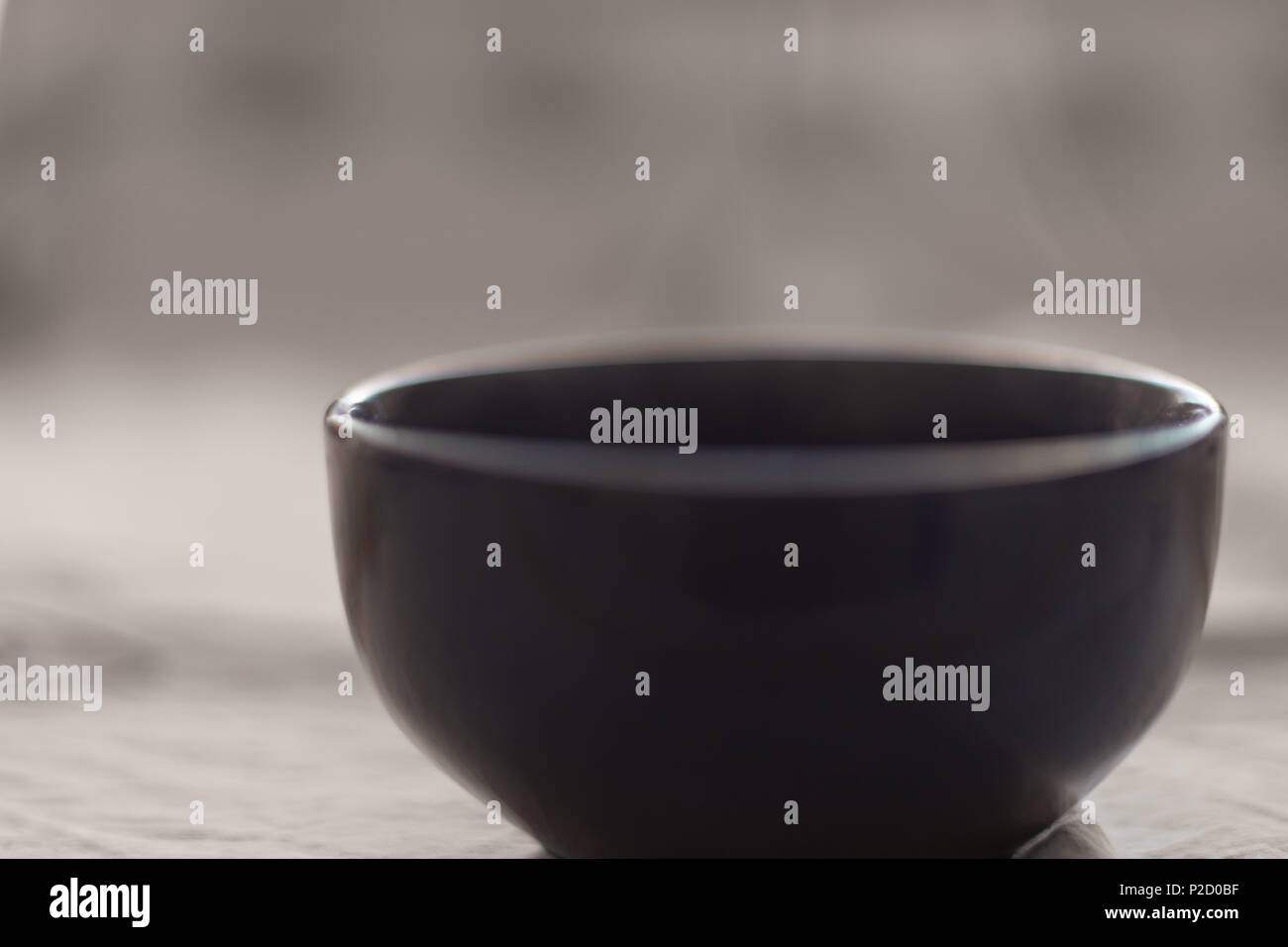 round large bowl over which steam Stock Photo
