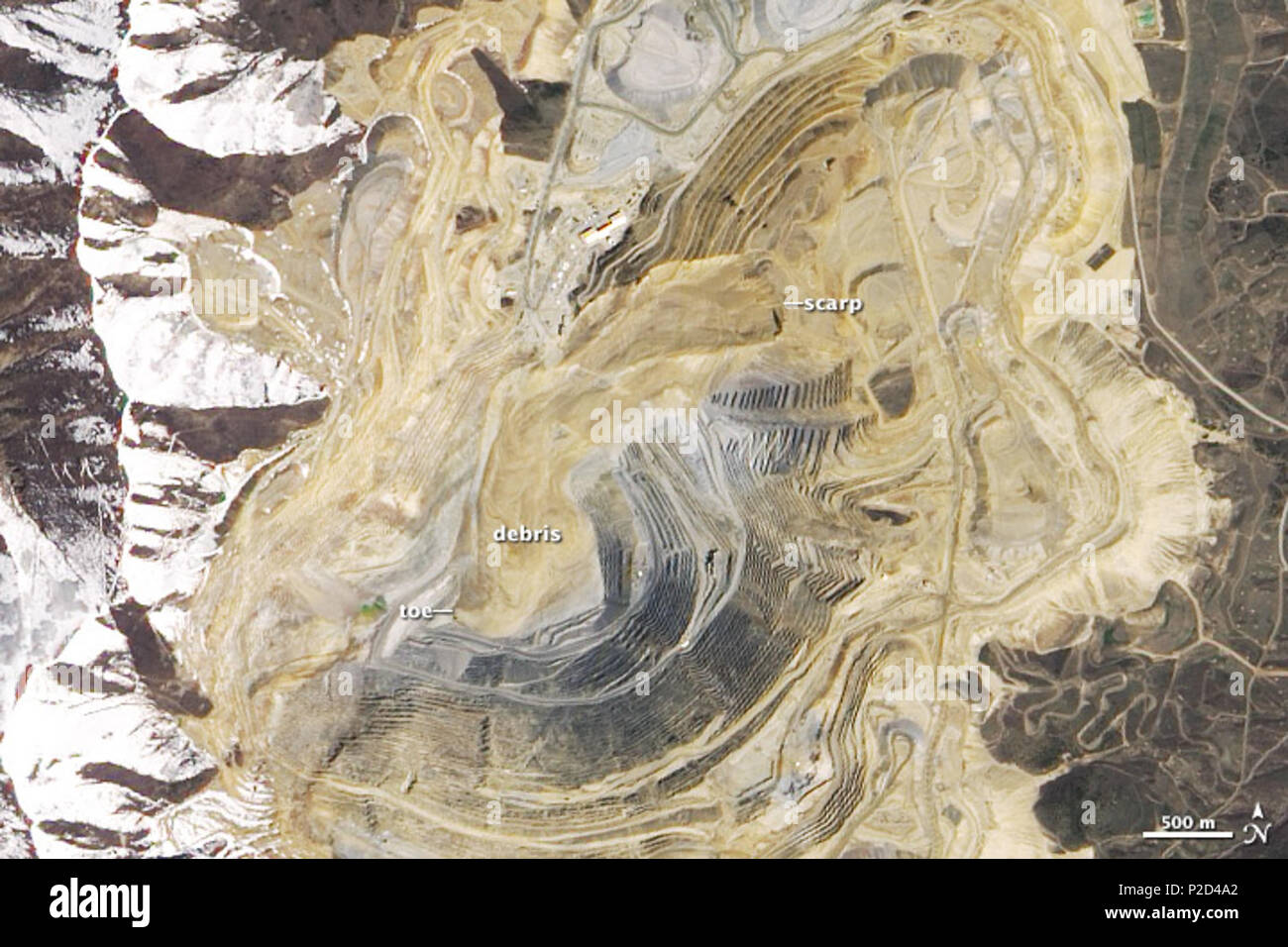 . English: Bingham Canyon Mine Satellite image after Landslide acquired on May 2, 2013 . 2 May 2013. NASA Earth Observatory image by Jesse Allen and Robert Simmon 7 Bingham Canyon Mine Satellite image after Landslide Stock Photo