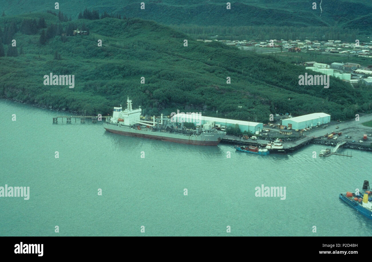 . English: Blueberry Hill and marine facilities in Valdez, Alaska as it appeared in 1989. There has been quite a bit more development of the area shown since this photo was taken. The hill was originally called Meals Hill, after Valdez businessman Owen Meals, who owned much of the surrounding area prior to the moving of the Valdez townsite following the 1964 Alaska earthquake. The building located atop the hill may be the Meals residence, but I'm not entirely certain of that. 4 June 1989. ARLIS Reference 8 Blueberry Hill, Valdez, Alaska Stock Photo