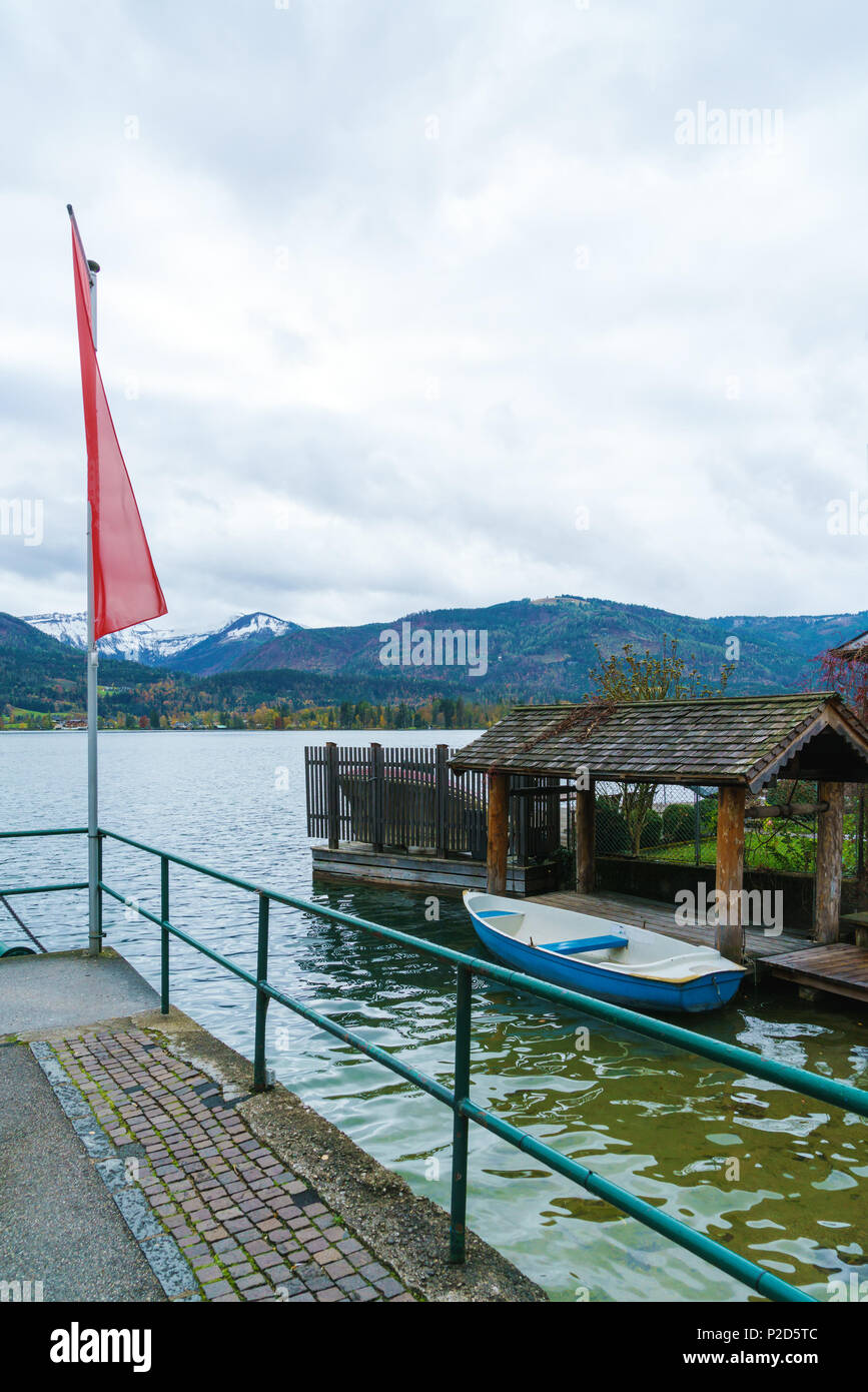 Quay on Lake Wolfgang or Wolfgangsee near St. Wolfgang town and Schafberg Alps mountain, Salzkammergut resort, Austria Stock Photo
