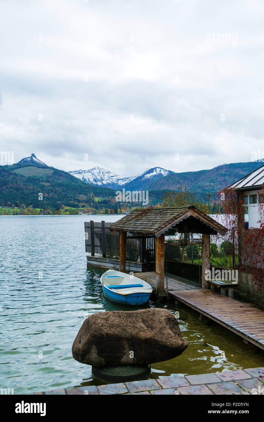 Quay on Lake Wolfgang or Wolfgangsee near St. Wolfgang town and Schafberg Alps mountain, Salzkammergut resort, Austria Stock Photo