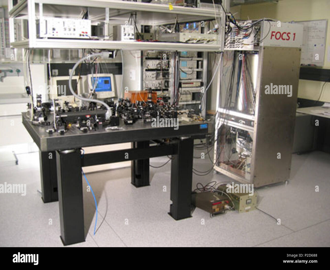 Deutsch: Atomuhr FOCS-1 (Schweiz) English: Atomic Clock FOCS-1 (Switzerland).  The primary frequency standard device, FOCS-1, one of the most accurate  devices for measuring time in the world. It stands in a