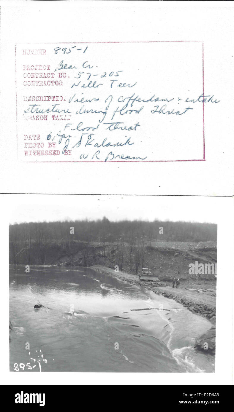 . English: Shows the filling of water into the cofferdam and intake during construction after heavy rains in early April 1958. 6 April 1958. Nello L. Teer Company 20 Francis E. Walter Dam Construction Cofferdam Flooding 01 Stock Photo