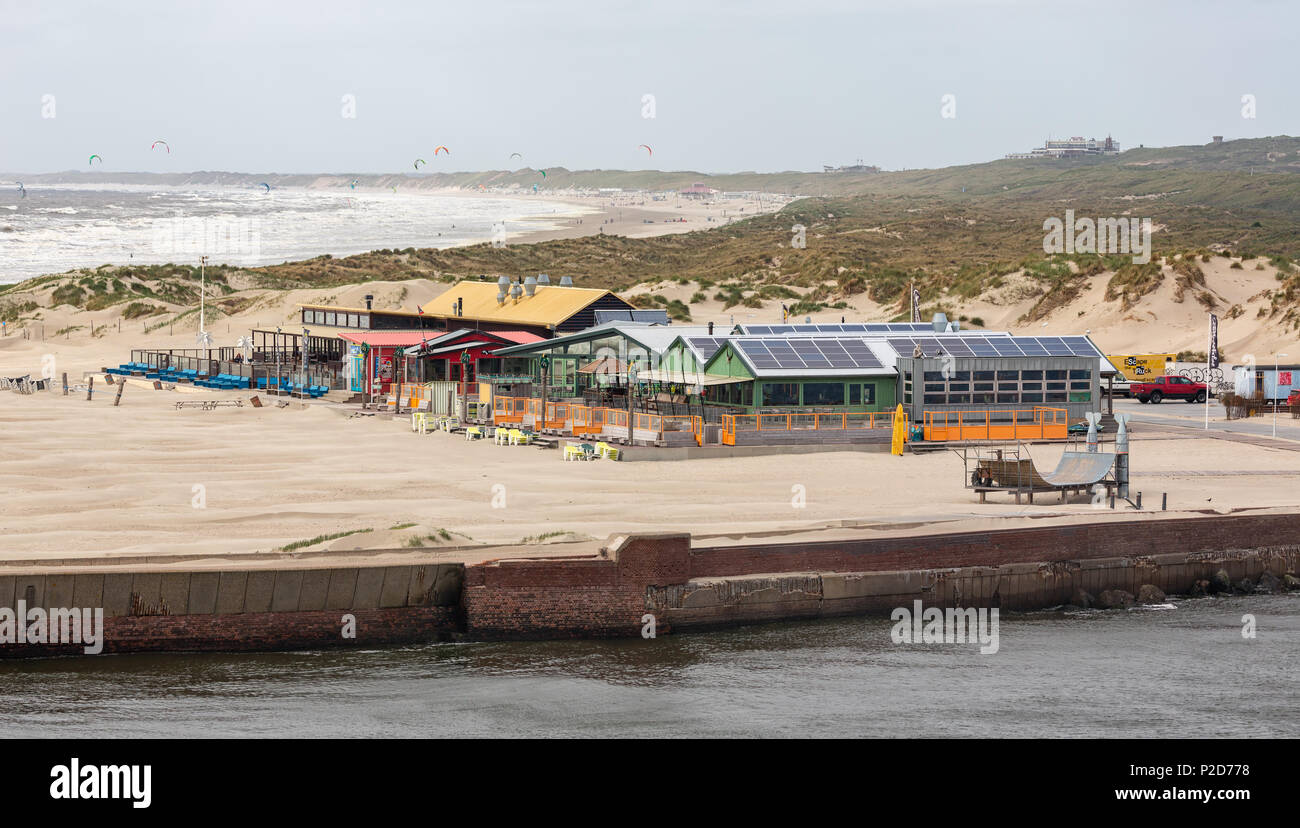 Dutch Inn Kite Dutch beach restaurant pavilion with kite surfers in the background ...