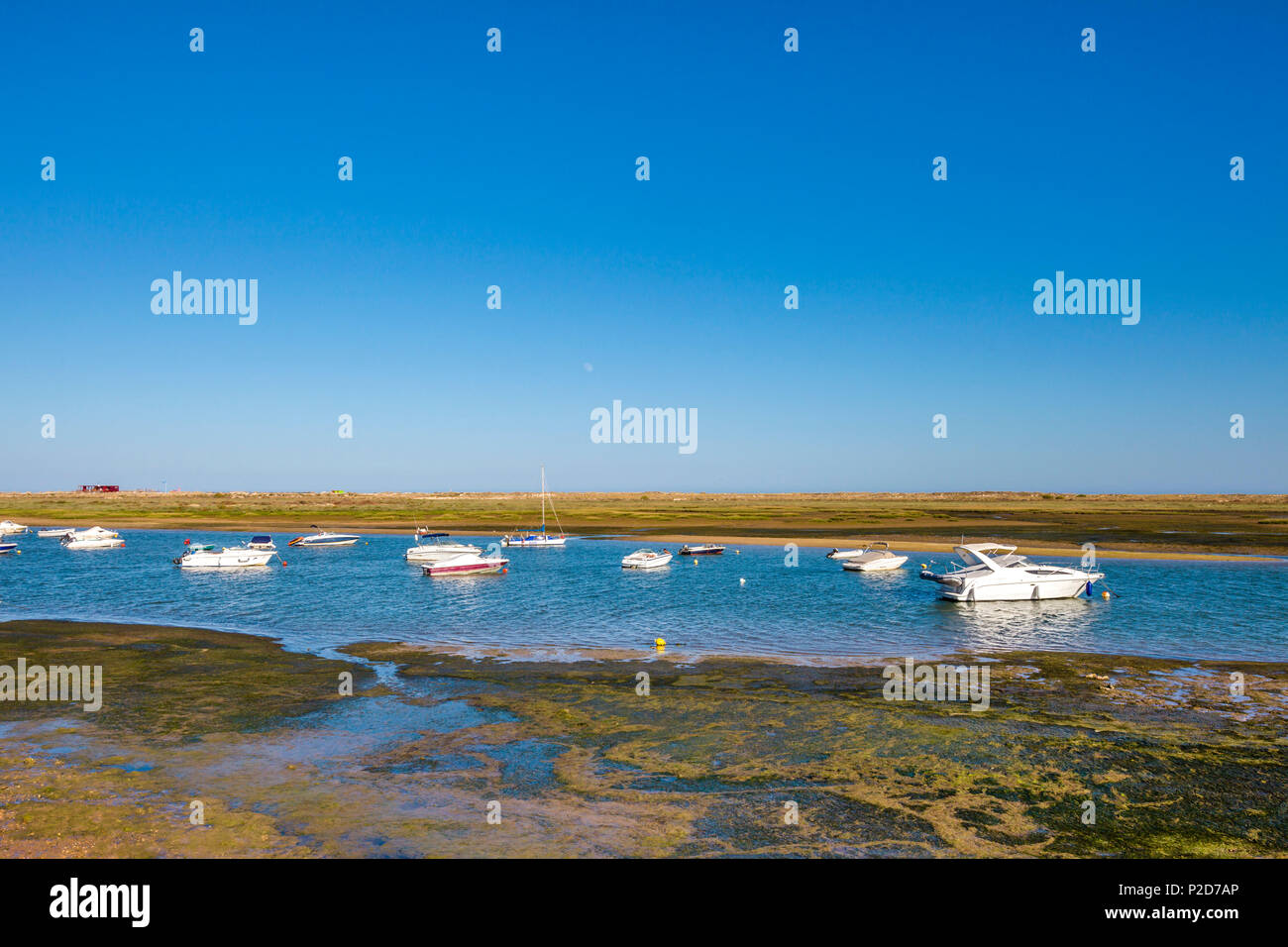 Boats in the lagoon, Cabanas near Tavira, Algarve, Portugal Stock Photo