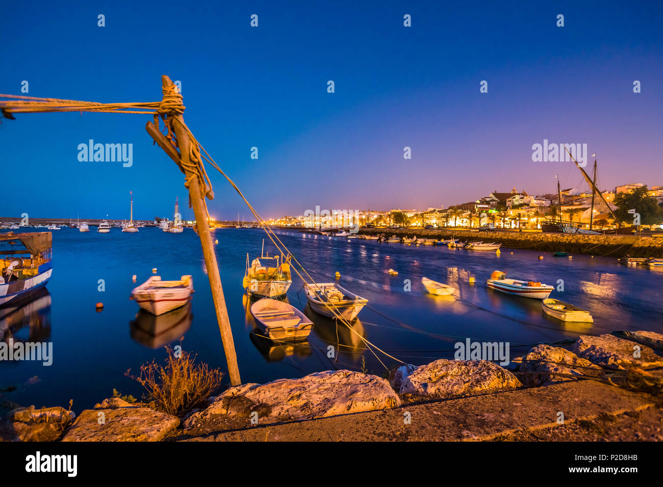 View from harbour towards old town at twilight, Lagos, Algarve, Portugal Stock Photo