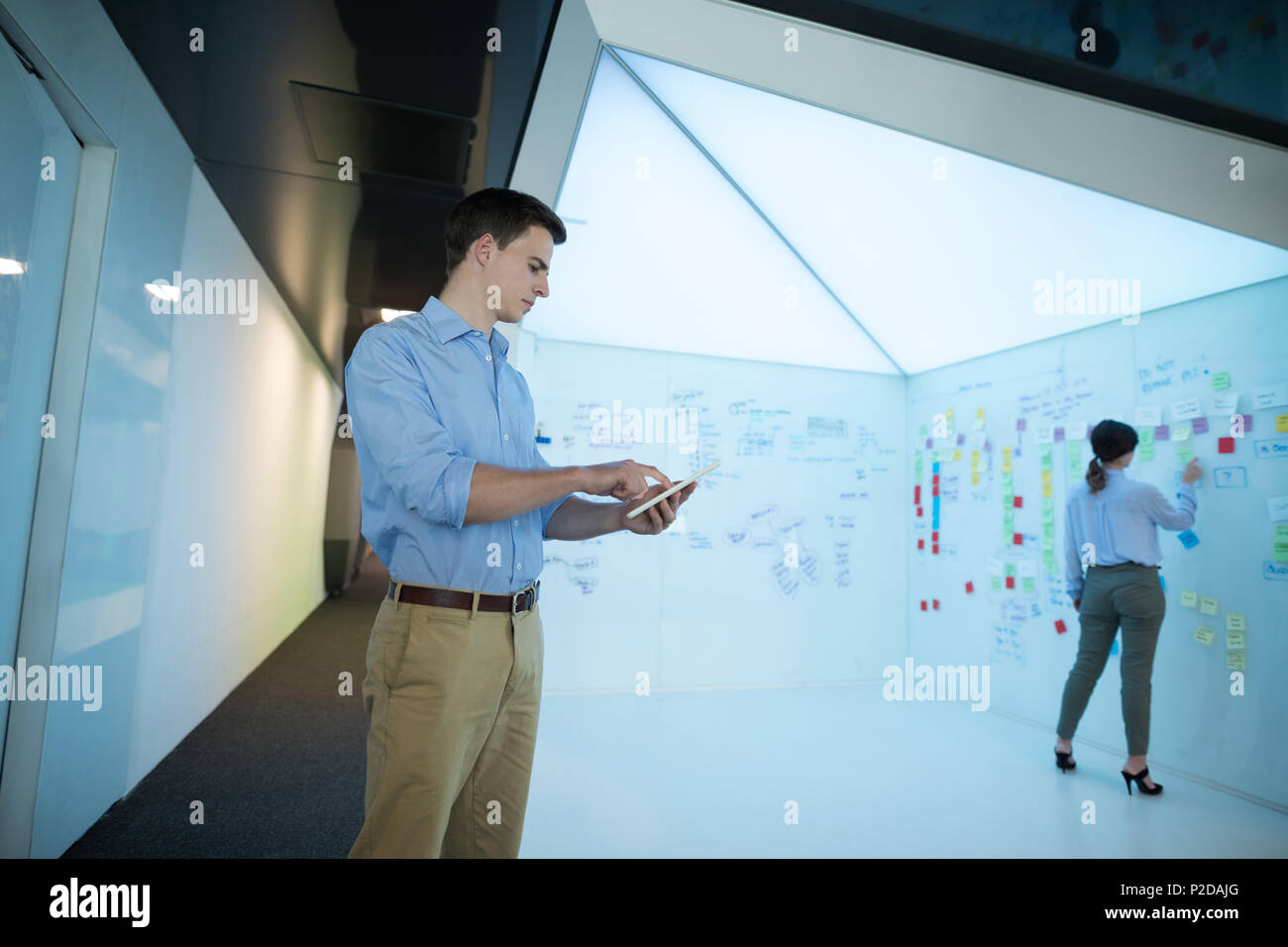 Male executive using digital tablet Stock Photo