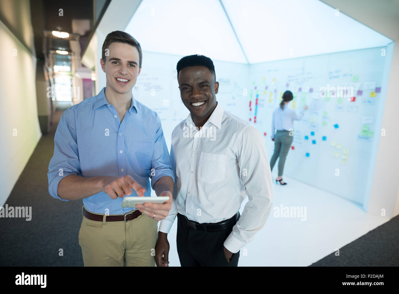 Portrait of male executives using digital tablet Stock Photo