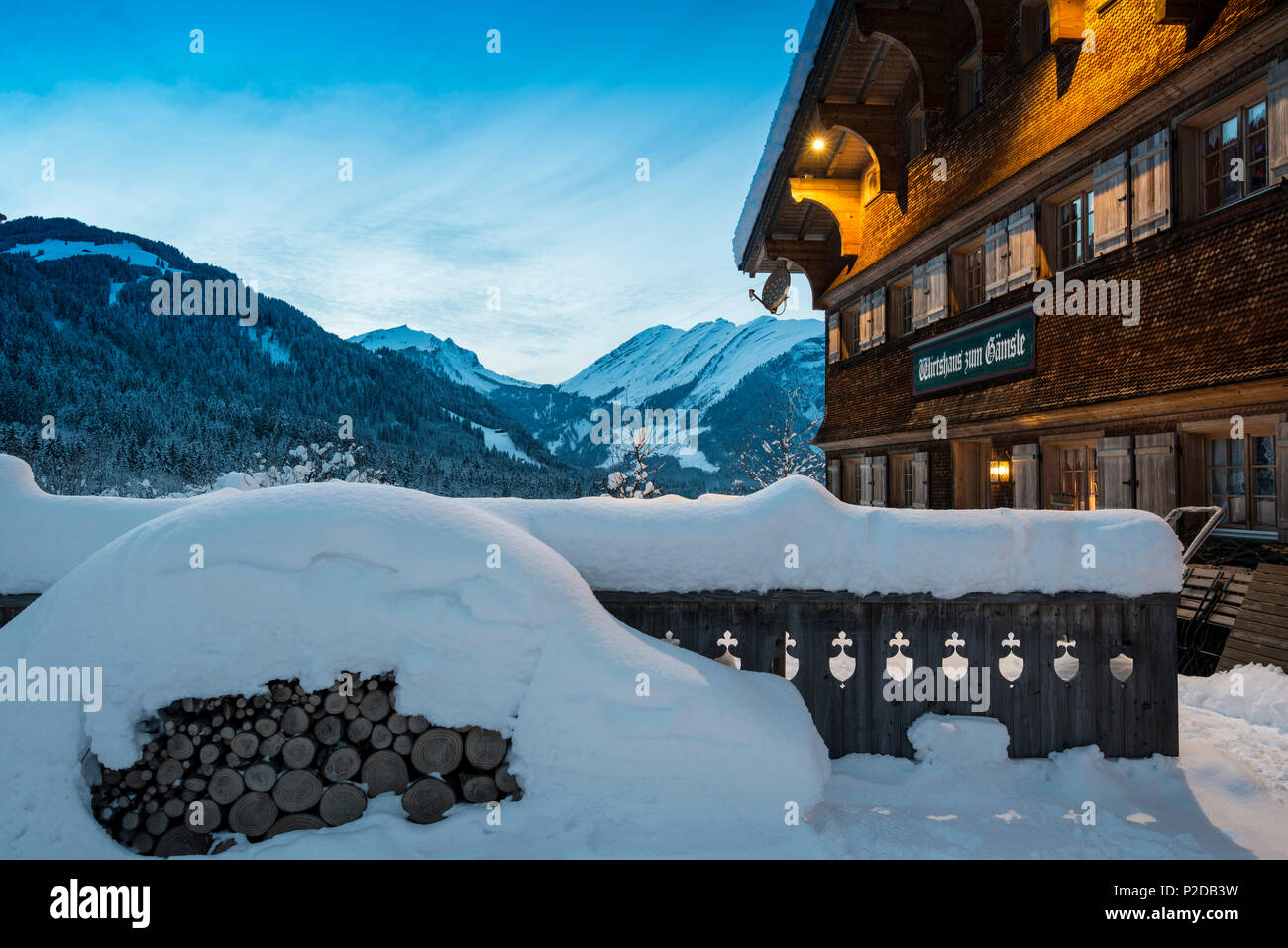 snow covered tavern, Schoppernau, Bregenz district, Vorarlberg, Austria Stock Photo
