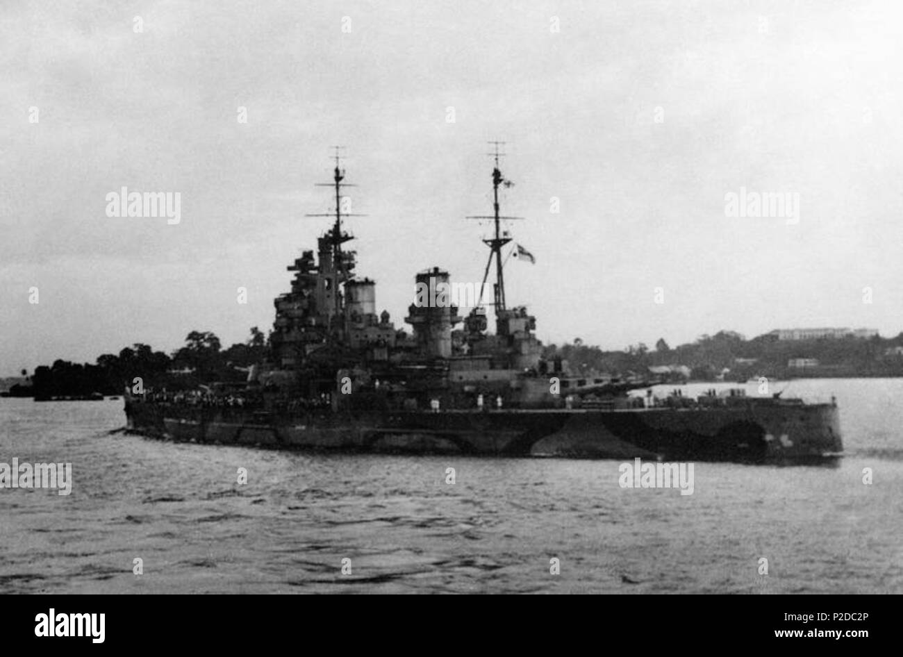 . The Royal Navy battleship HMS Prince of Wales leaving Singapore on 8 December 1941 for her final cruise. She was sunk by Japanese aircraft on 10 December. 8 December 1941. Adams, W L G (Captain) Commanding Officer, HMS CORINTHIAN 25 HMS Prince of Wales Singapore (041562) Stock Photo