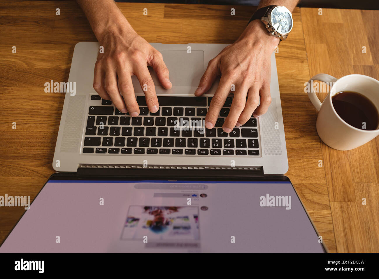 Man using his laptop Stock Photo