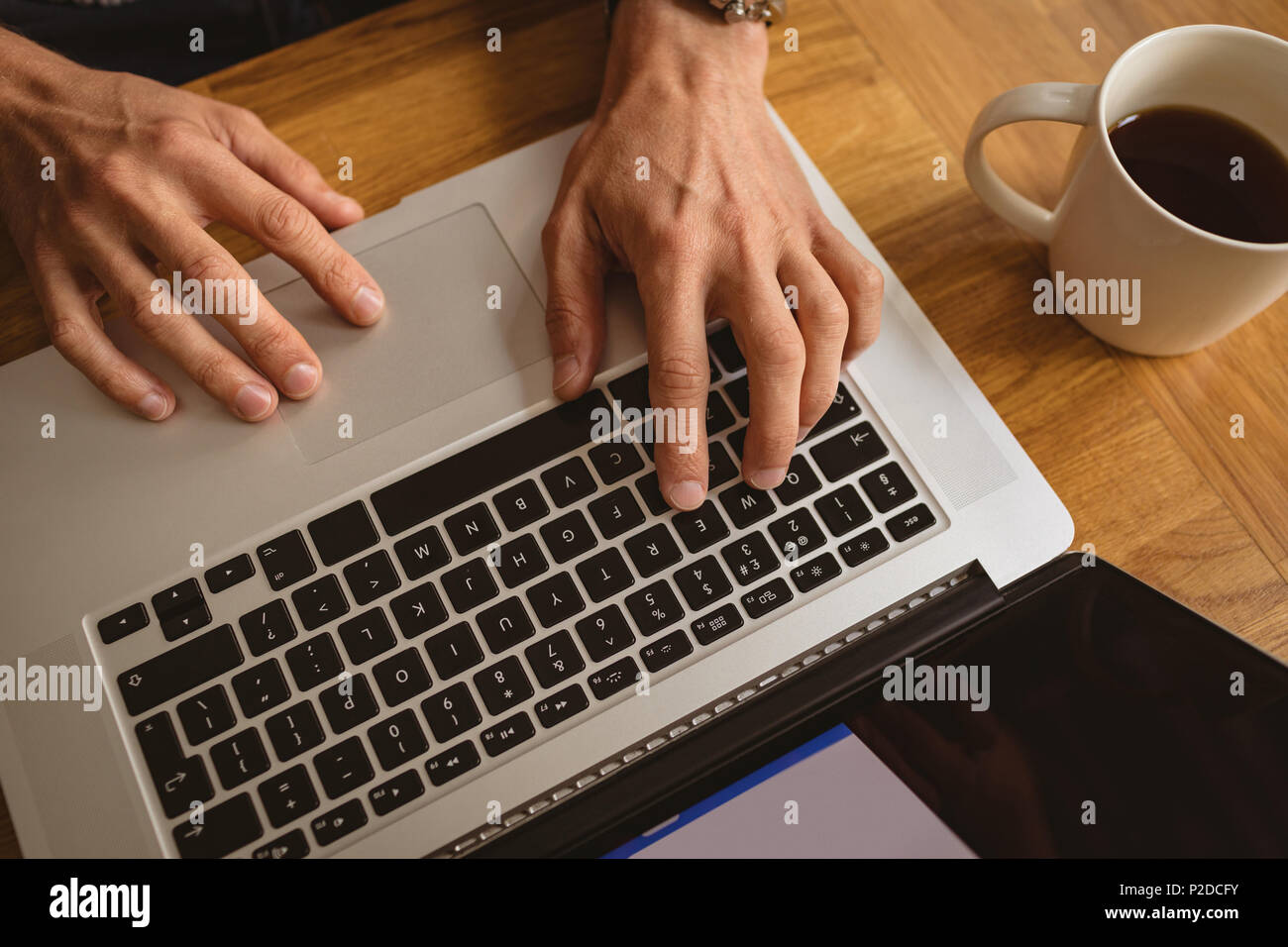 Man using his laptop Stock Photo
