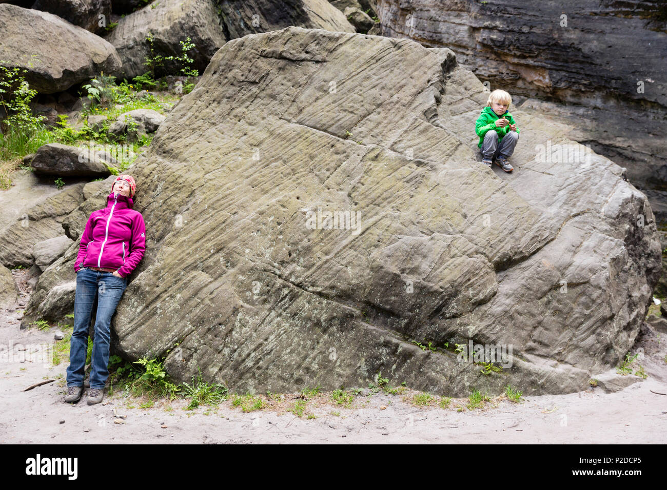 Mother and son resting on rocks, climbing area, Saxony Switzerland, Elbe sandstone mountains, MR, Dresden, Saxony, Germany, Euro Stock Photo