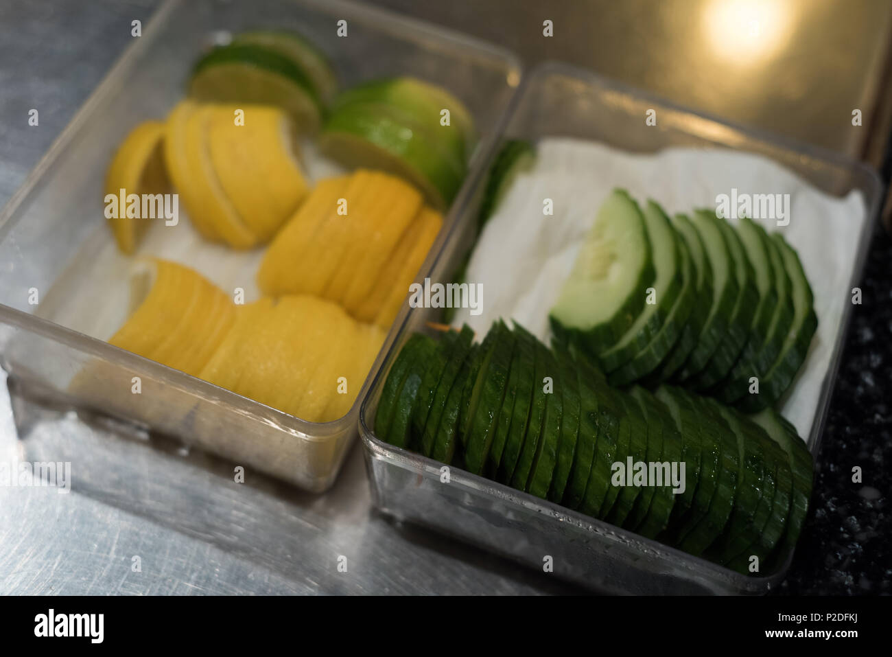 Sliced vegetables kept on kitchen counter Stock Photo