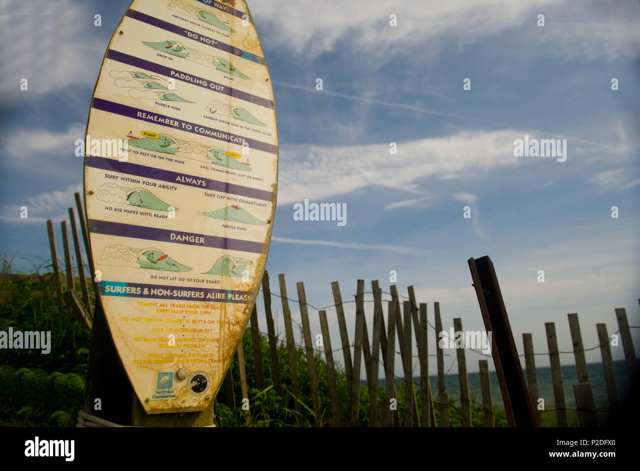 MONTAUK, NEW YORK-JUNE 8: Sign of surfer rules of etiquette on on surf boar in Ditch Plains Beach in Montauk, New York are seen on June 8, 2018. Stock Photo