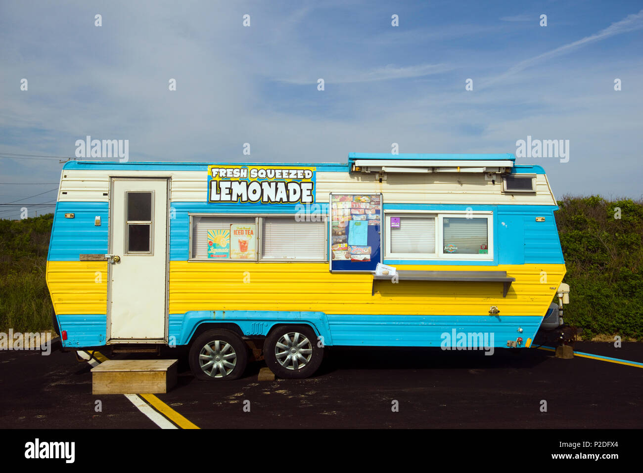 MONTAUK, NY-JUNE 8: A lemonade and ice cream wagon is seen in parking lot in Montauk, New York by popular surfing Ditch Plains Beach on June 8,2018. Stock Photo