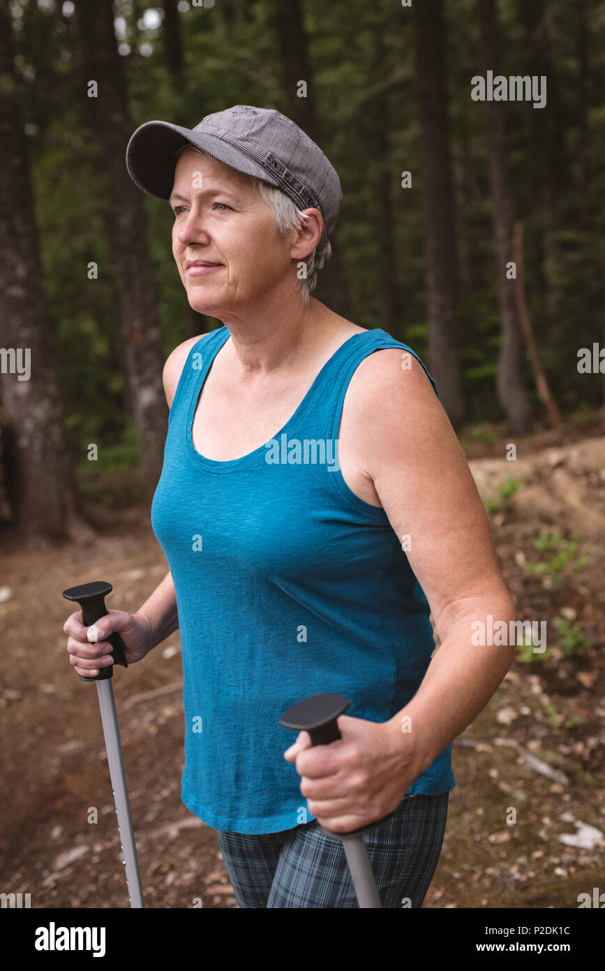 Mature woman standing hi-res stock photography and images - Alamy