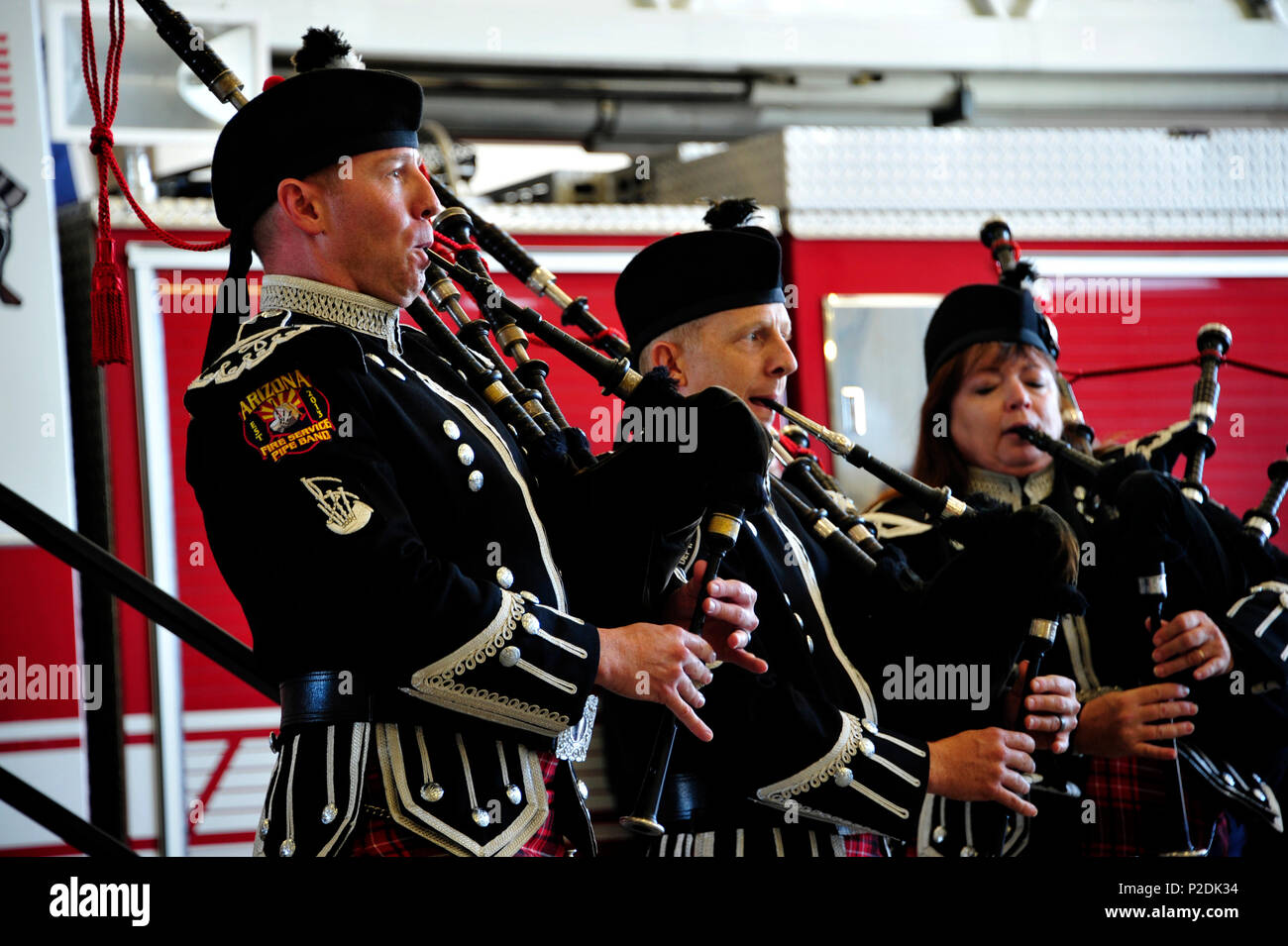 Members from the Tucson Highlanders Pipes and Drums Scottish Pipe Band  performs during a 9/11 remembrance ceremony held at Davis-Monthan Air Force  Base, Ariz., Sept. 9, 2016. The band played “Amazing Grace”