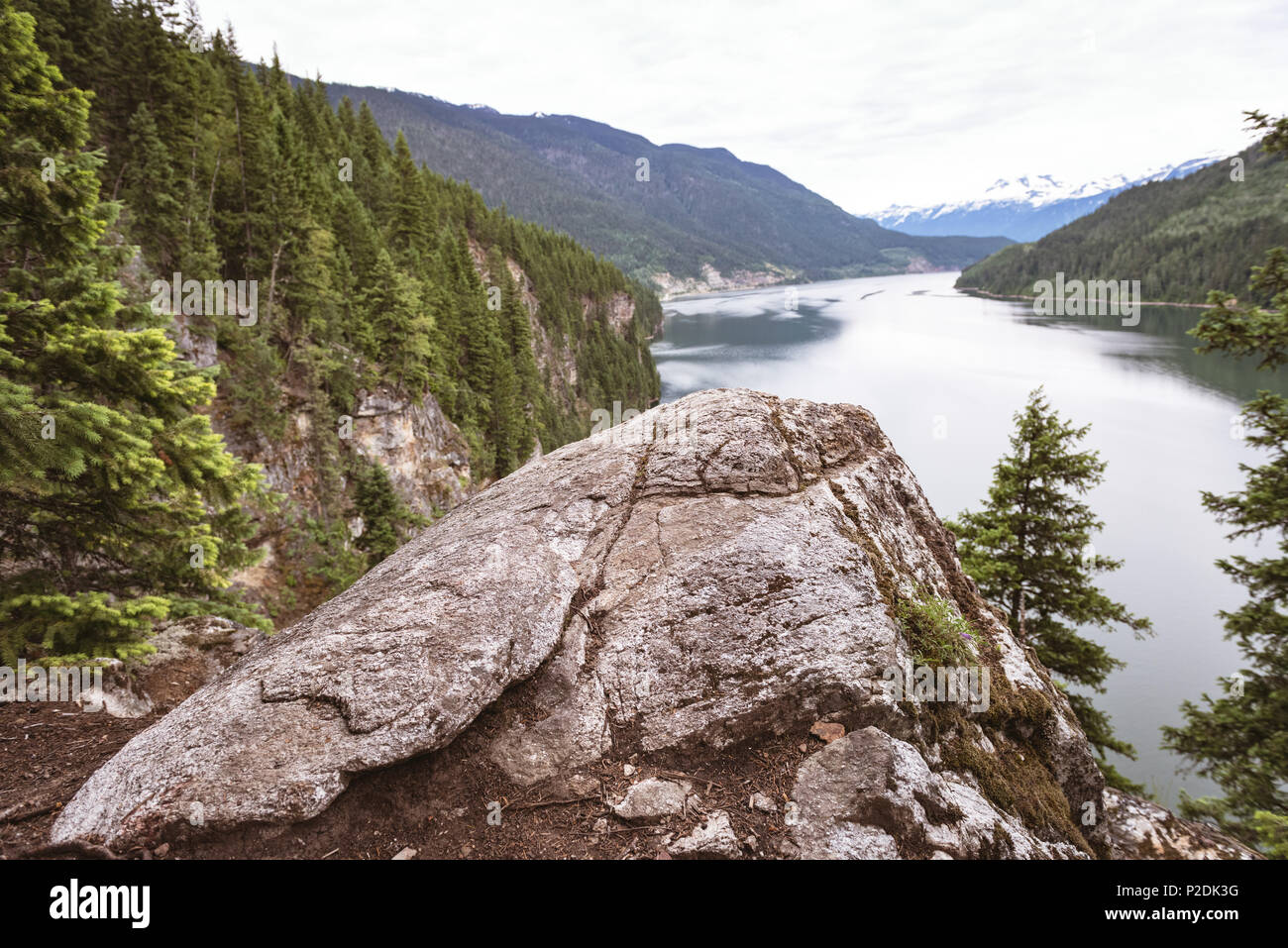 Beautiful mountains and green lake Stock Photo