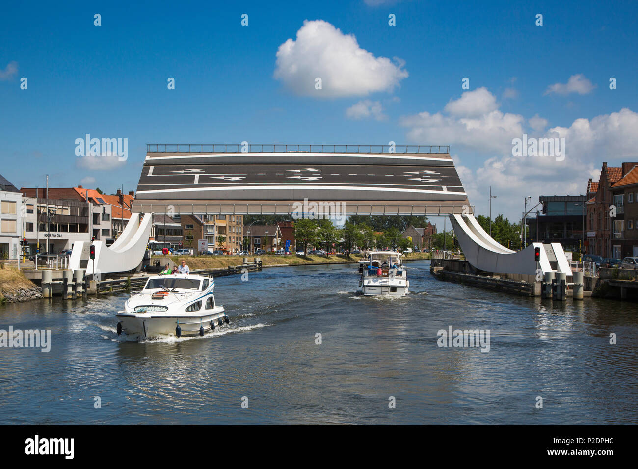 Le Boat Elegance houseboat and Scheepsdalebrug drawbridge on the Bruges - Ostend canal, near Bruges Brugge, Flemish Region, Belg Stock Photo