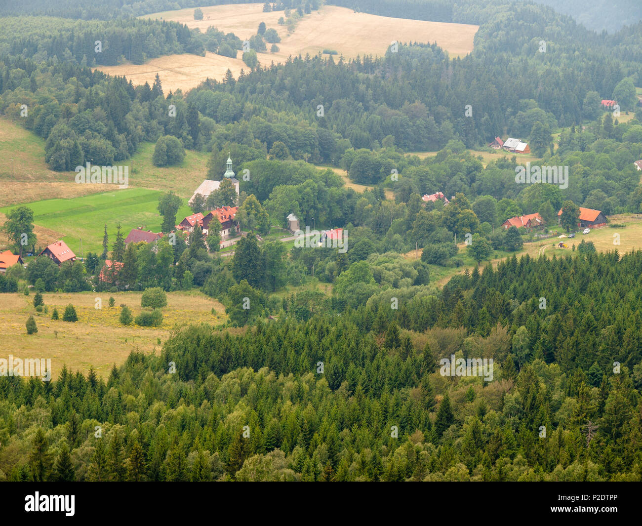 View of a mountain village from Szczeliniec Wielki, the highest peak of  Table Mountains (Góry Stołowe), Poland Stock Photo - Alamy