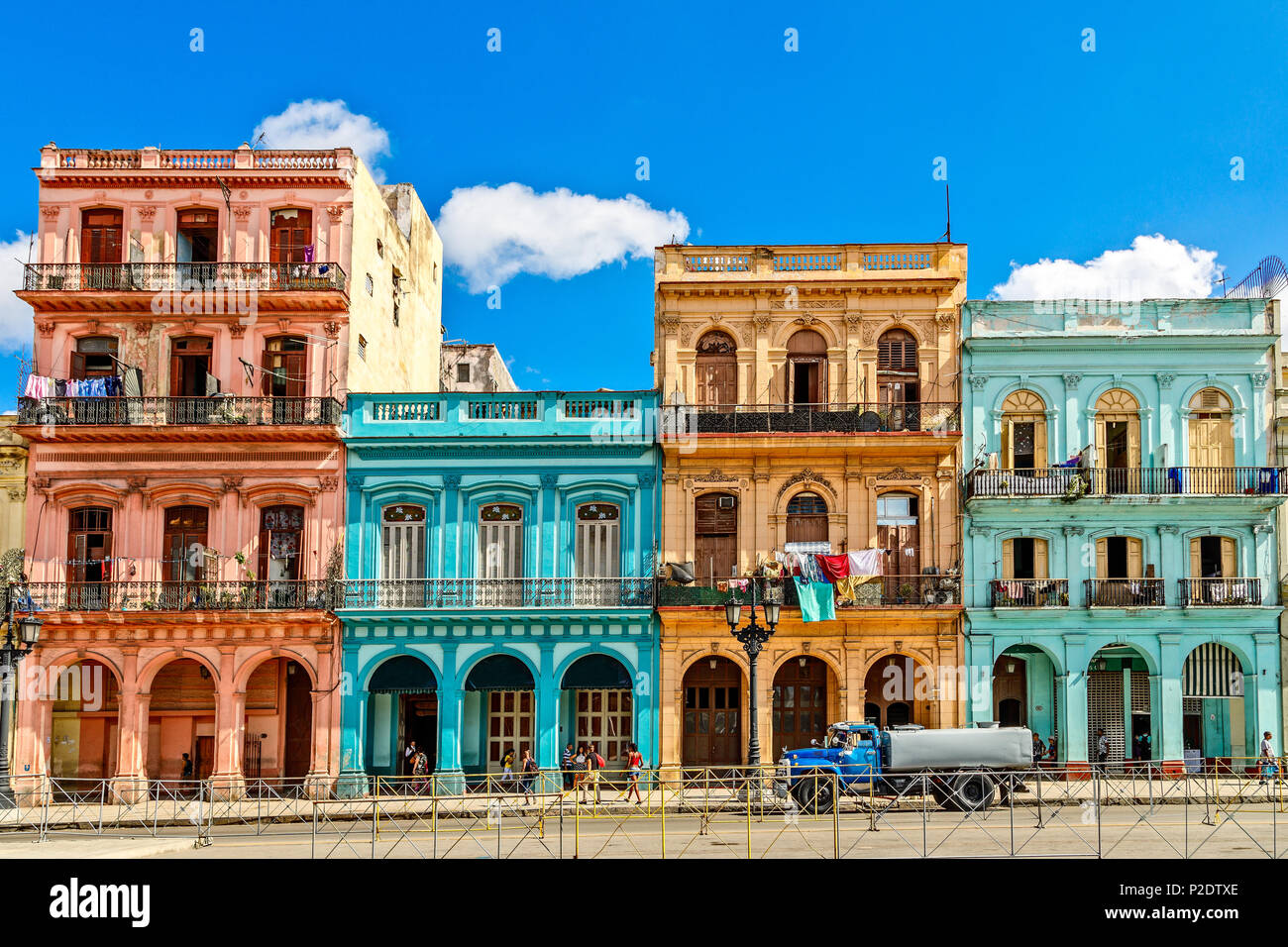 Old living colorful houses across the road in the center of Havana, Cuba Stock Photo Alamy