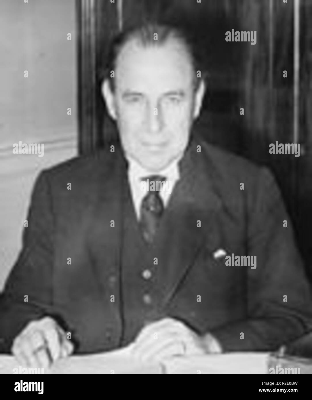 . English: Sir John Anderson, the Chancellor of the Exchequer, seated at his desk at the Treasury, the day before he presented the budget. April 1944. unknown; image held by the Imperial War Museum 28 John Anderson cropped Stock Photo