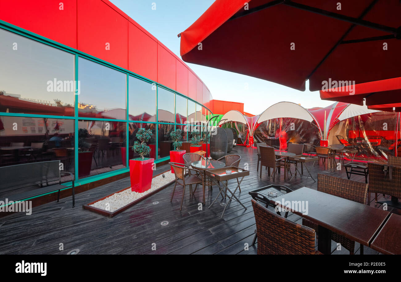 MOSCOW - SEPTEMBER 2014: The design of the stylish and modern interior of the Japanese restaurant 'Tokyo Bay'. Open veranda on the roof Stock Photo