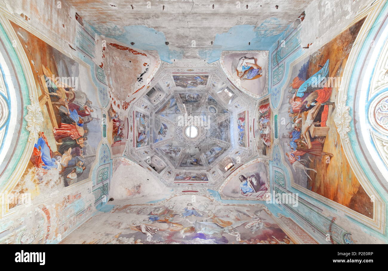 Dome with ceiling painting on biblical themes in an abandoned brick Orthodox Church in the late 19th century, inside Stock Photo