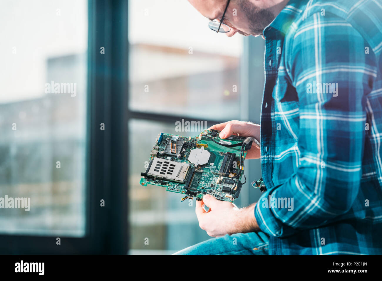 Hardware engineer working with circuit board Stock Photo Alamy