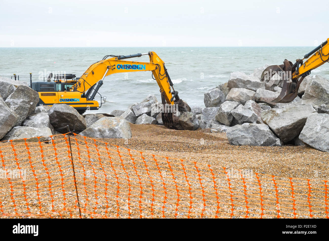 Stockpiling of 6-9 tonne rock for the Hastings coast protection works, harbour arm, hastings, east sussex, uk Stock Photo