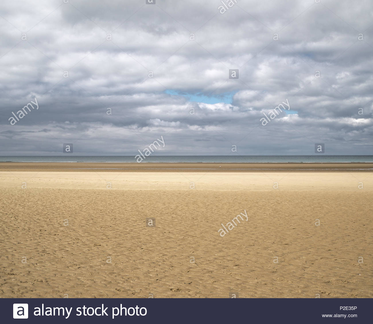 Peaceful Vista Of Empty Sea And Sand At Omaha Beach