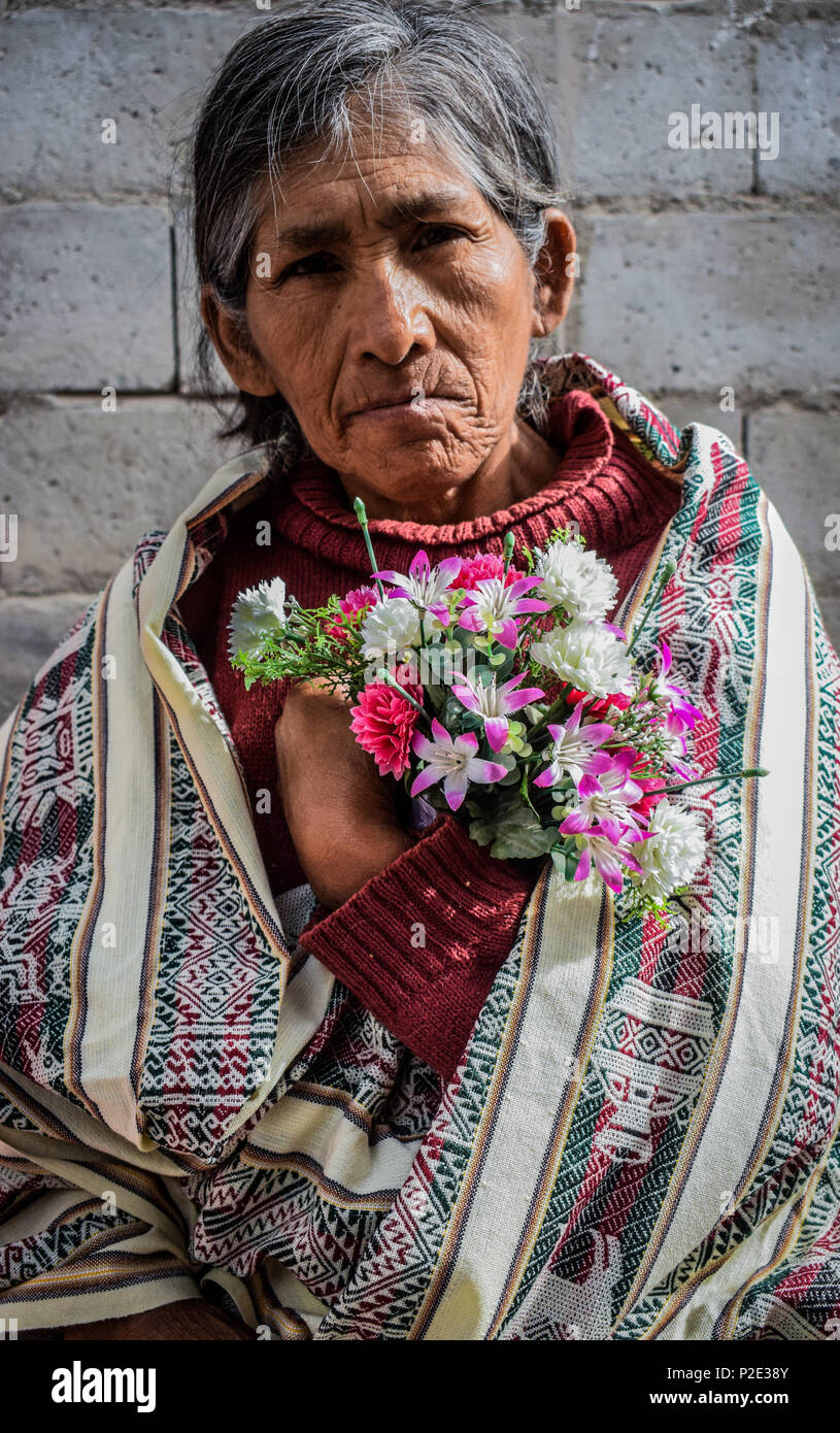 portrait of the old women with flowers / retrato de anciana con flores Stock Photo