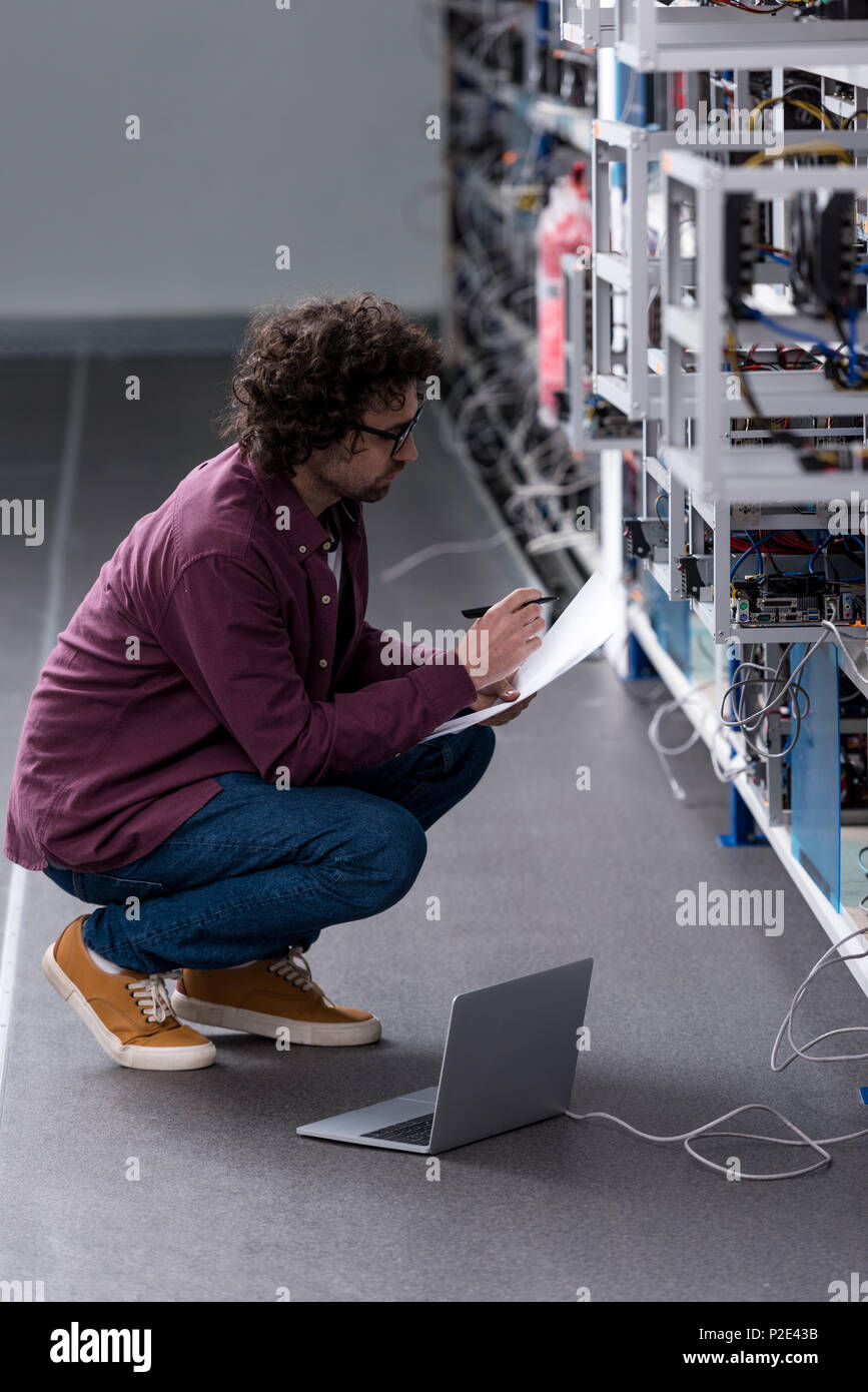 Serious computer engineer working hi-res stock photography and images ...