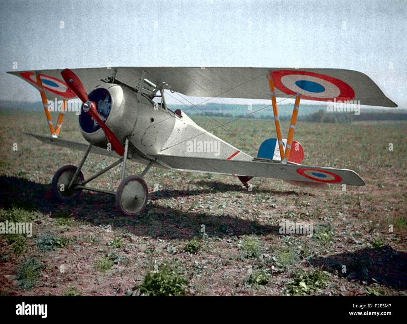 . English: WW1 - Nieuport biplane fighter. (Haut-Rhin, France 1917) by Paul Castelnau This image has been digitally manipulated. 1917. Paul Castelnau  The factual accuracy of this description or the file name is disputed. Reason: Attributed to Fernand Cuville by Réunion des musées nationaux [1] 37 Nieuport 23 C.1 (colour) Stock Photo