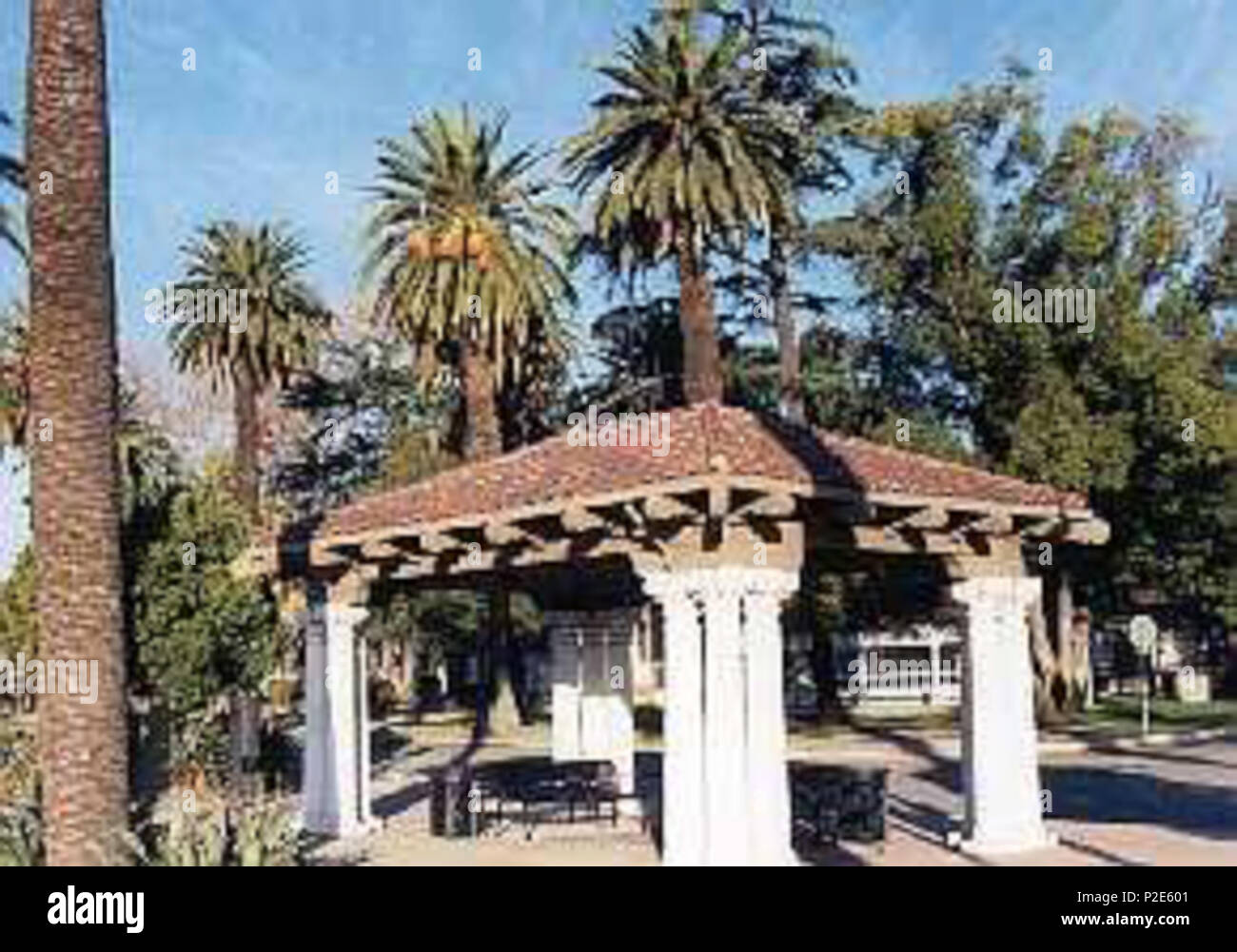 . English: The waiting pavilion at Ontario Train Station (Amtrak) — in Ontario, Inland Empire, Southern California.  With old Canary Island date palm (Phoenix canariensis) trees.   . 15 May 2007 (original upload date). The original uploader was Mackensen at English . 38 Ontario Amtrak station Stock Photo