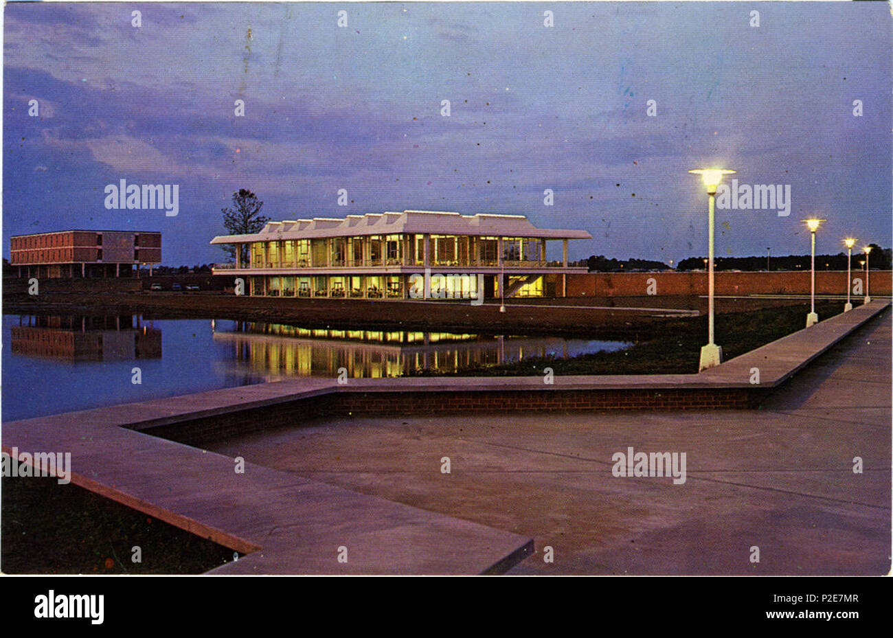 . English Buildings and the lake at St. Andrews University in