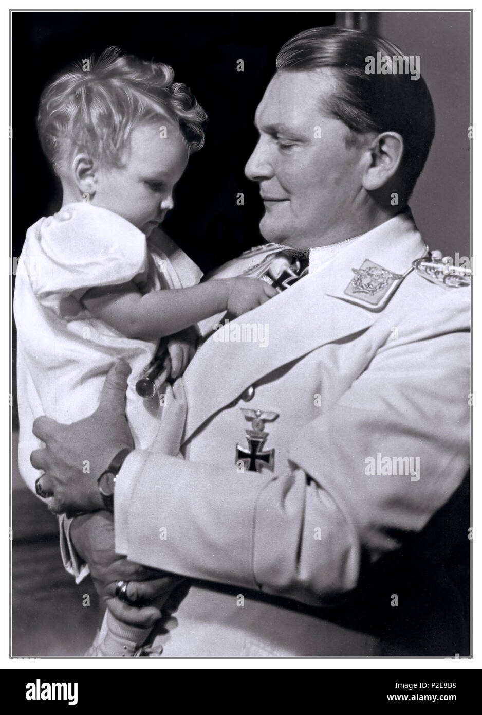 HERMANN GOERING Vintage paternal portrait 1930’s Infant Edda Goering with her uniformed father Hermann Goering head of Nazi Luftwaffe 1938 Berlin  Nazi Germany Stock Photo