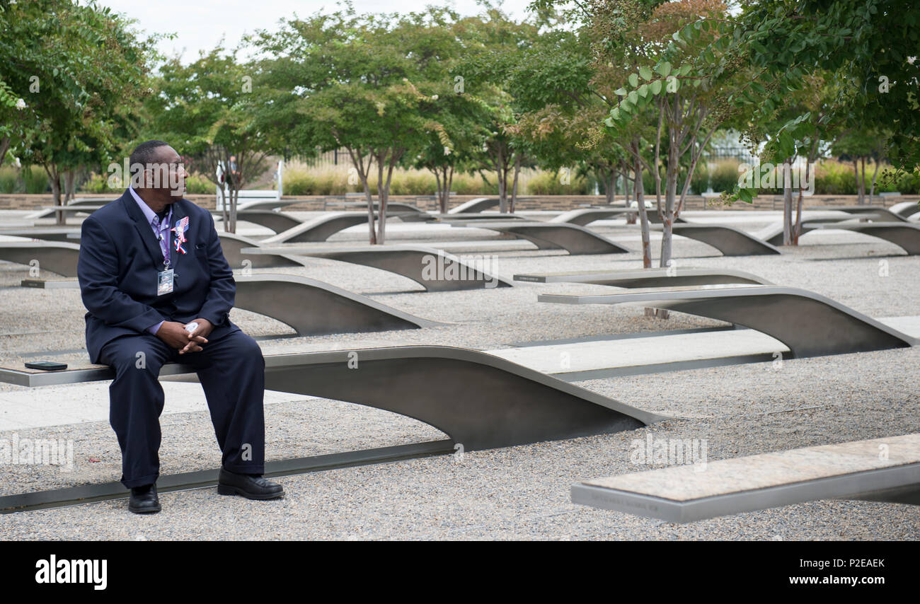 Retired U.S. Air Force Master Sgt. William Fields takes a moment during a ceremony honoring the 15th anniversary of the 9/11 attacks Sept. 11, 2016, at the Pentagon in Washington, D.C. His wife, Amelia Fields, had been working at the Pentagon for just two days when she died during the attacks. It was her 46th birthday. (DoD photo by U.S. Air Force Tech. Sgt. Brigitte N. Brantley) Stock Photo