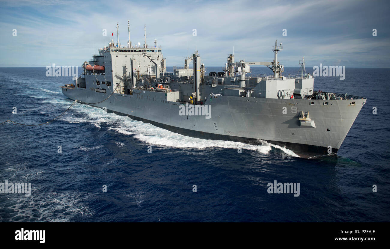 160910-N-QW941-003 PACIFIC OCEAN (Sept. 10, 2016) Dry cargo ship USNS Matthew Perry (T-AKE 9), refuels hospital ship USNS Mercy (T-AH 19) during a replenishment at sea. Deployed in support of Pacific Partnership 2016, Mercy is sailing to her homeport of San Diego. (U.S. Navy photo by Mass Communication Specialist 3rd Class Trevor Kohlrus/Released) Stock Photo