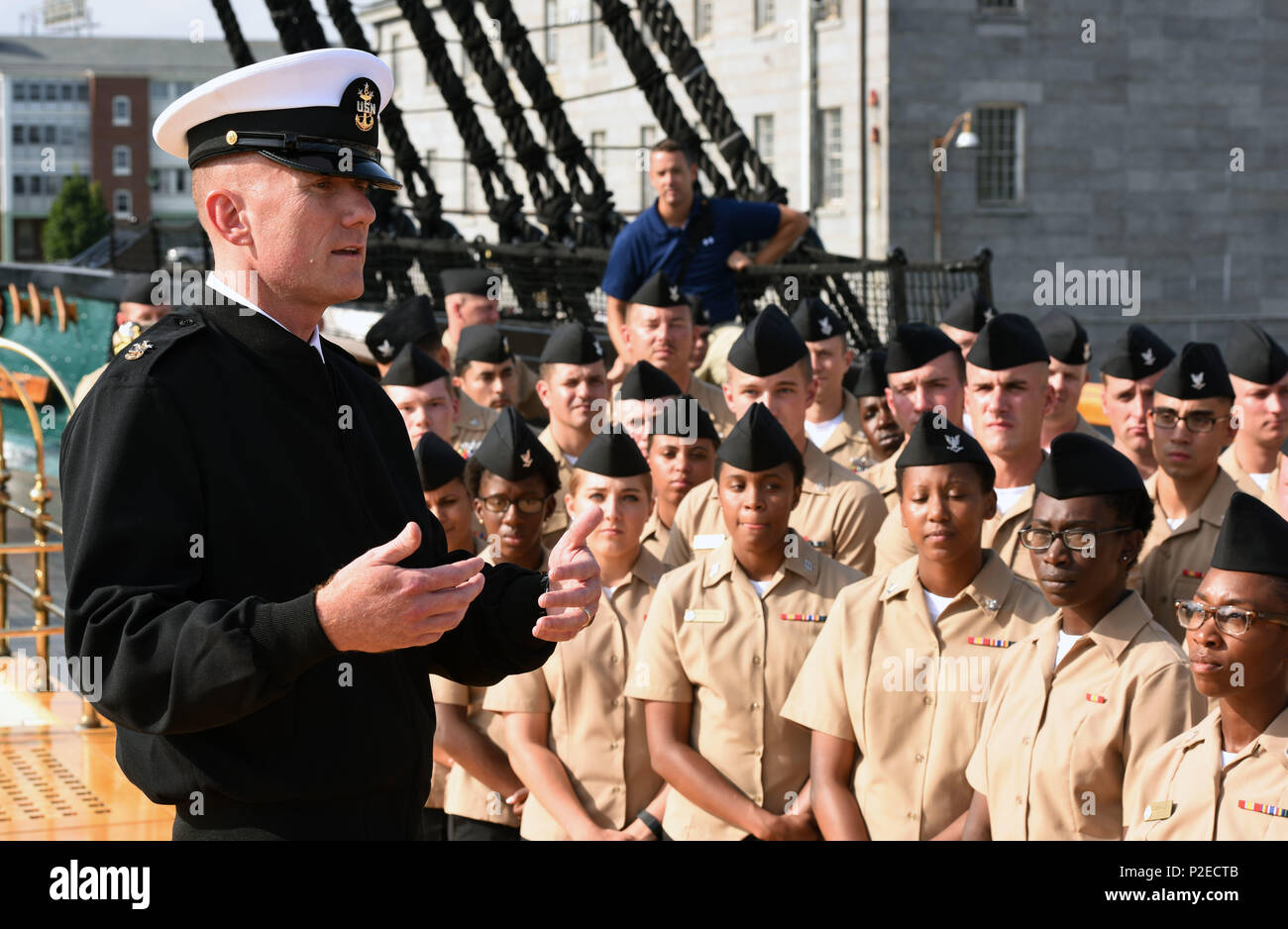 160908-N-OT964-157  BOSTON (Sept. 8, 2016) Master Chief Petty Officer of the Navy (MCPON) Steven Giordano speaks with Sailors during an all hands call as part of his visit to USS Constitution.  The ship, nicknamed 'Old Ironsides', is the oldest commissioned ship in the Navy, and was Giordano's first visit as the 14th MCPON. Chief of Naval Operations (CNO) Adm. John Richardson was also present with Giordano during the call. (U.S. Navy photo by Mass Communication Specialist 1st Class Martin L. Carey/Released) Stock Photo